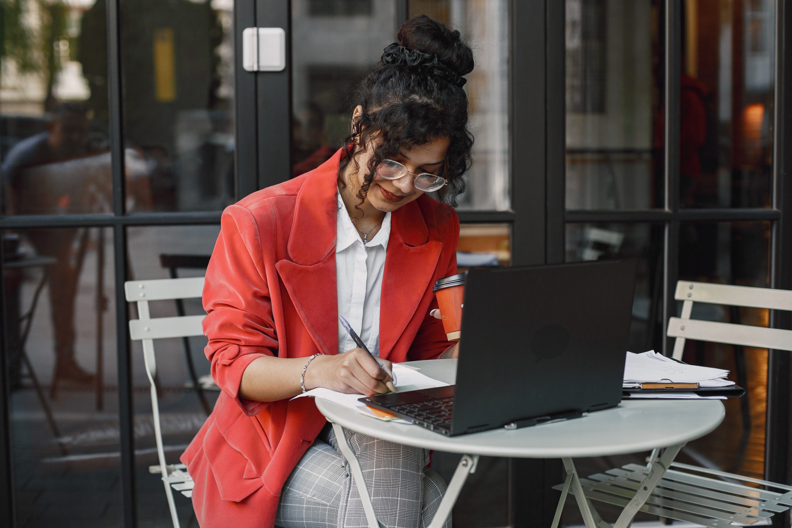 ndian woman working laptop - Web Design Agency